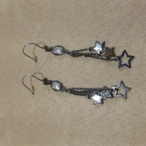 Juicy Couture blackened silver plated dangle star earrings worn once.